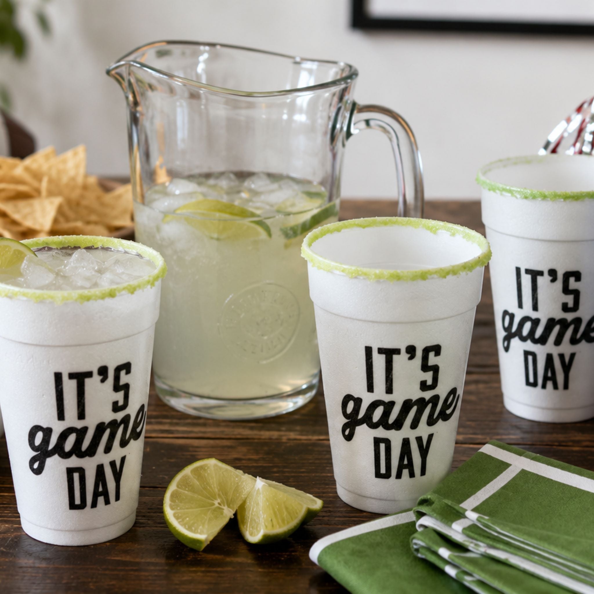 Rita Rims Pre-Rimmed Game Day Cups next to a pitcher of drink