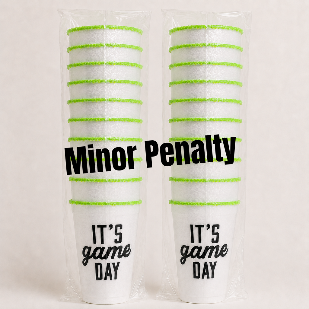 Two stacks Rita Rims styrofoam Game Day cups in clear plastic packaging, each with lime green horizontal stripes near the top and the phrase 'IT'S game DAY' printed in black on the front. A large black text overlay reads 'Minor Penalty' across the center.