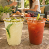 Two Rita Rims pre-rimmed cups filled with party drinks on a casual home entertaining table