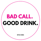 A square graphic with a thin pink circular border on a white background. The text reads 'BAD CALL. GOOD DRINK.'