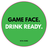 A circular green sticker or decal with a pink border, featuring the text 'GAME FACE. DRINK READY.