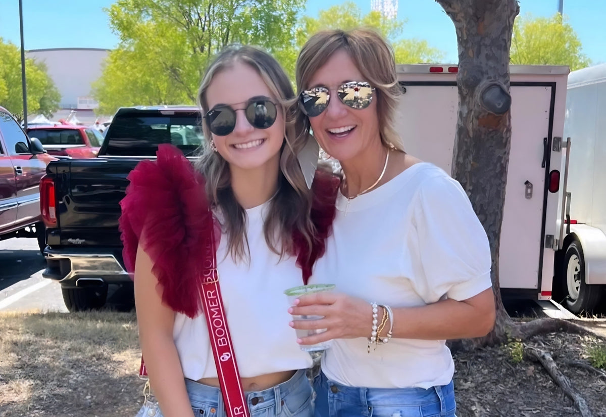 Tawney, owner of Rita Rims, holding a pre-rimmed party cup