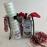 Party supplies including cups and a bag on a white background