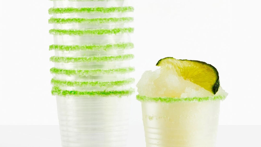 5 oz Rita Rims Salt & Lime cup with frozen margarita inside topped with a lime slice.