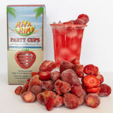 Rita Rims party cups with sugar and strawberry rims, surrounded by strawberries on a white background