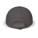 Adjustable fabric strap and antique brass buckle on the Tailgate MVP cap in dark grey. 